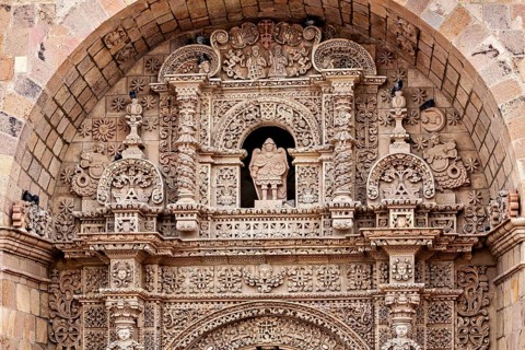 Detailed stone decorations and reliefs on a historic building, The churches of the city of Potosi