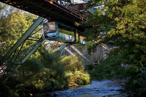 The Wuppertal suspension railway over the riverbed of the Wupper near the Kluse stop, Wuppertal,