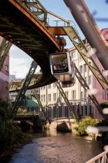 The Wuppertal suspension railway over the riverbed of the Wupper near the Kluse stop, Wuppertal,