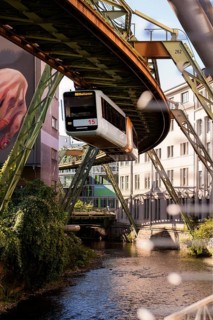 The Wuppertal suspension railway over the riverbed of the Wupper near the Kluse stop, Wuppertal,