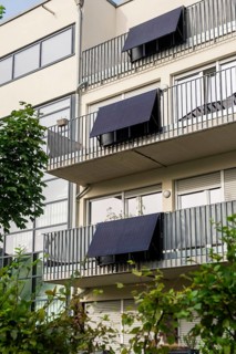 Balcony power stations on an apartment block in Düsseldorf, Germany