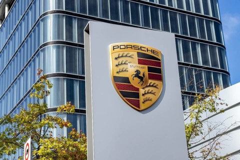 Porsche Centre Autohaus am Pragsattel. Porsche Design Tower skyscraper. Logo on a stele. Stuttgart,
