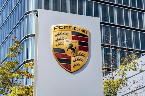 Porsche Centre Autohaus am Pragsattel. Porsche Design Tower skyscraper. Logo on a stele. Stuttgart,