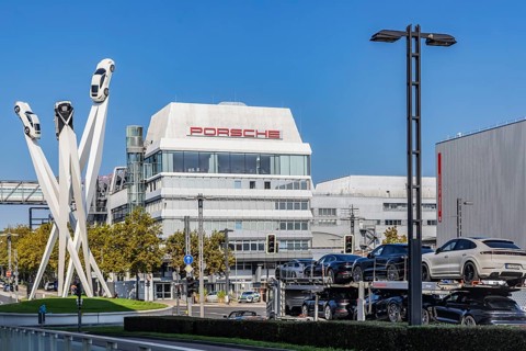 Porscheplatz with Porsche headquarters. Inspiration 911 artwork by Gerry Judah: three steles, each