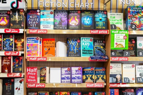Fiction chart of bestselling books inside WH Smith, TG Jones, bookshop, England, UK