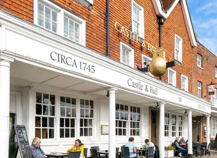 Frontage of historic building, Castle and Ball hotel public house, Marlborough, Wiltshire, England,