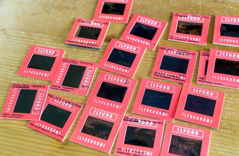 Red cardboard slide mounts some with written captions Ilford Ilfochrome transparency positive film,