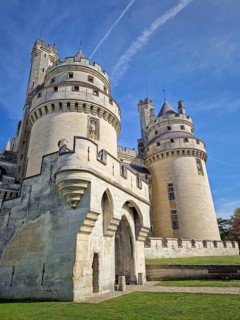 Chateau de Pierrefonds romanticized french medieval architecture with imposing towers and