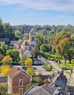 High-angle view of the charming town of Pierrefonds with view to the historic Eglise Saint-Sulpice.