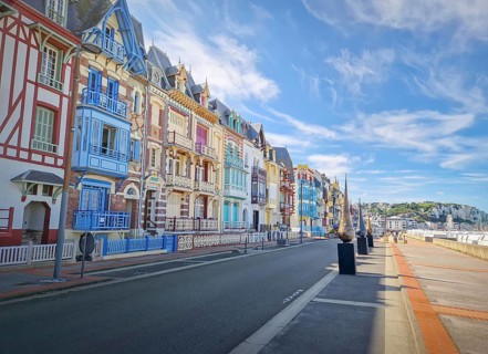 Charming Belle Epoque villas of Mers-les-Bains coastline town, arranged along the seaside promenade