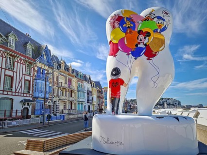 Mers-les-Bains, France - August 28, 2023 Large tooth art, Forever smile by Florence Muliardo,