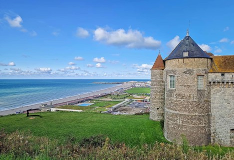 Chateau de Dieppe, a historic fortress perched on a cliff overlooking the turquoise waters of the
