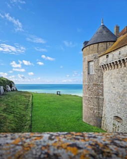 Chateau de Dieppe, a historic fortress perched on a cliff overlooking the turquoise waters of the