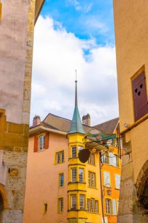 Old Town with Corner House with Tower and Sky and Clouds in a Sunny Autumn Day in City of Biel,
