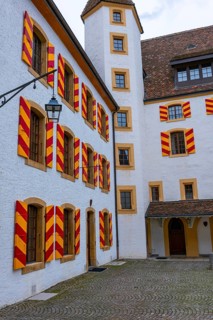 Neuchatel Castle with Window and Shutter and Patio in Old Town in a Foggy Day in City of Neuchatel,