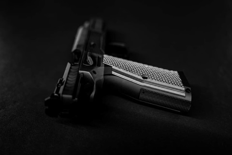 Modern Elegant Sport Handgun For IPDA on Grey Background in Switzerland