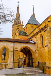 Beautiful Cathedral Collégiale de Neuchatel and Branch with Sky in City of Neuchatel, Canton