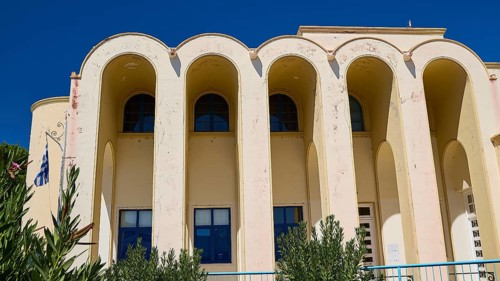Primary school, Front view of a Mediterranean building with large arches, Historicism, Art Deco,