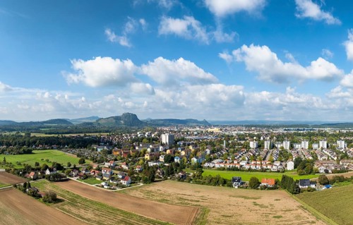 Aerial view of the town of Singen am Hohentwiel, on the horizon the Hegau Mountains, district of