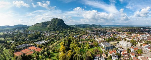 Aerial view of the town of Singen am Hohentwiel with the state garden show grounds, on the right