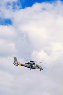 French marine helicopter flying on the sky, Crozon peninsula, Bretagne, France