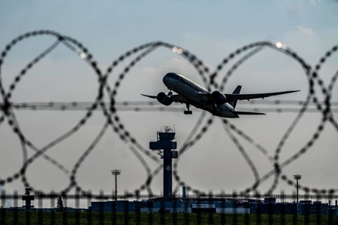 Symbolic image security at the airport, outer fence at Düsseldorf International Airport, steel wire