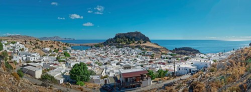 Panoramic view of the town of Lindos with Acropolis on the coast with a blue sky, Acropolis,