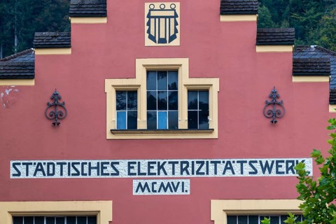 Façade with lettering, historic building, municipal power station, Mühletorplatz, Feldkirch,
