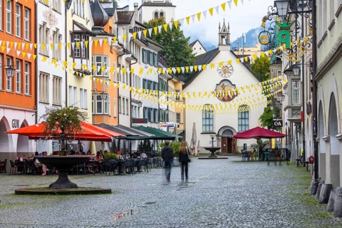 Market square, historic buildings, fountain, St John's Church, Feldkirch, Vorarlberg, Austria