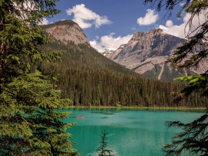 Kayak on Emerald Lake with the Canadian Rocky Mountains landscape within Yoho National Park in