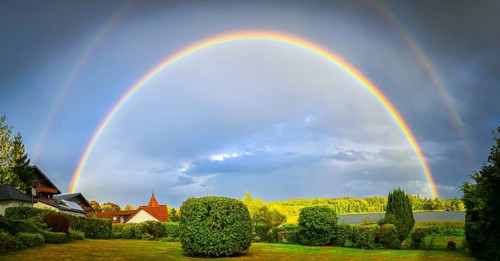 Double rainbow over the Großer Pönitzer See in Pönitz am See, Schleswig-Holstein, Germany