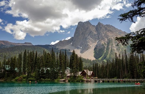 Scenic view of Emerald Lake and the Canadian Rocky Mountains with cabins from Emerald Lake Lodge