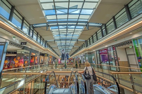 Shops, skylight and escalator in Forum Allgäu, Kempten, Allgäu, Swabia, Germany