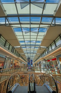 Shops, escalator and skylight in Forum Allgäu, Kempten, Allgäu, Swabia, Germany