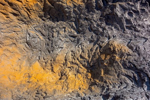 Full frame abstract bicolor rough stone surface