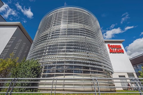 Blue sky, white clouds over the round car park of the Forum Allgäu, Kempten, Allgäu, Swabia,