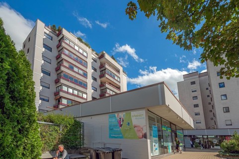 Blue sky. white clouds, high-rise building with bay windows, Kempten, Allgäu, Swabia, Germany