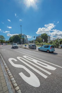 BUS letters, bus lane on asphalt, Bahnhofstraße, Kempten, Allgäu, Swabia, Germany