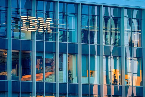 Jan 16, 2025 - Lisbon, Portugal: Day view of IBM office building with glowing logo and sleek glass
