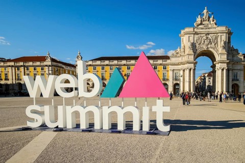 Nov 13, 2024 - Lisbon, Portugal: Web Summit sign displayed at Commerce square on sunny day under