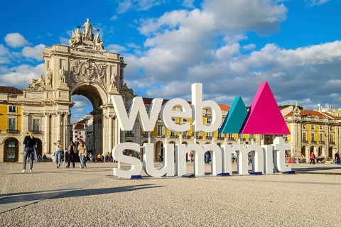 Nov 13, 2024 - Lisbon, Portugal: Big sign Web Summit near iconic Arco da Rua Augusta, beautiful