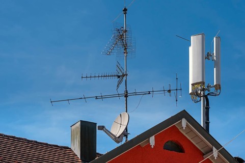 Red pointed gable with antennas and chimney, Allgäu, Baden-Württemberg, Germany