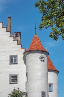Blue sky, old castle with turrets and chimneys in Kisslegg, Allgäu, Baden-Württemberg, Germany