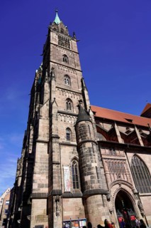 Noble Gothic church with impressive façade and bright blue sky in the background, Church of St.