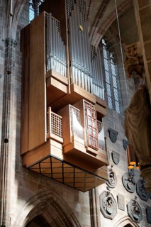 Large organ with wooden panelling and impressive pipes in the church, Church of St. Lawrence,