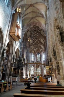 Large nave with impressive Gothic architecture and stained glass windows, St. Lawrence Church,