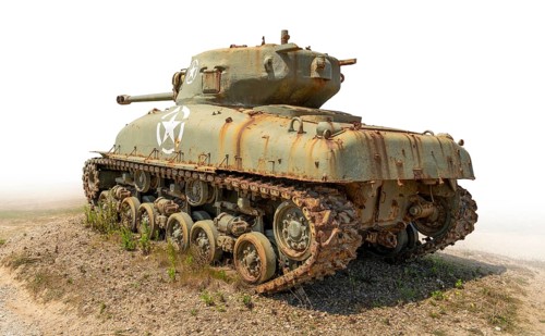 Historic tank at Utah Beach on the Cotentin Peninsula in France, gradient isolated in white back