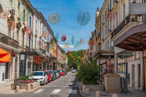 Impression of Orange, a commune in the Provence region in southeastern France at summer time