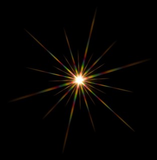 Colorful flashy spotlight star made with optical star filter on camera