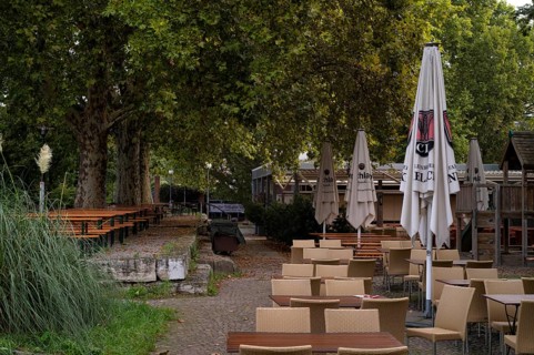 Beer garden on the Neckar, Neckar beer garden, empty, closed, Dinkelacker logo, Bad Cannstatt,